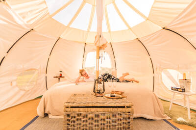 Inside a luxury glamping tent